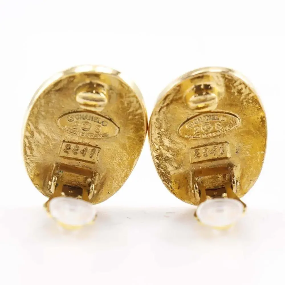 CHANEL Gold Logo Earrings